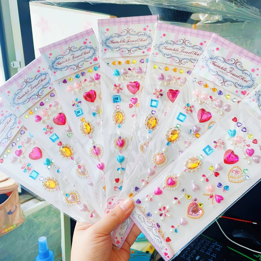 Assorted crystal face sticker styles