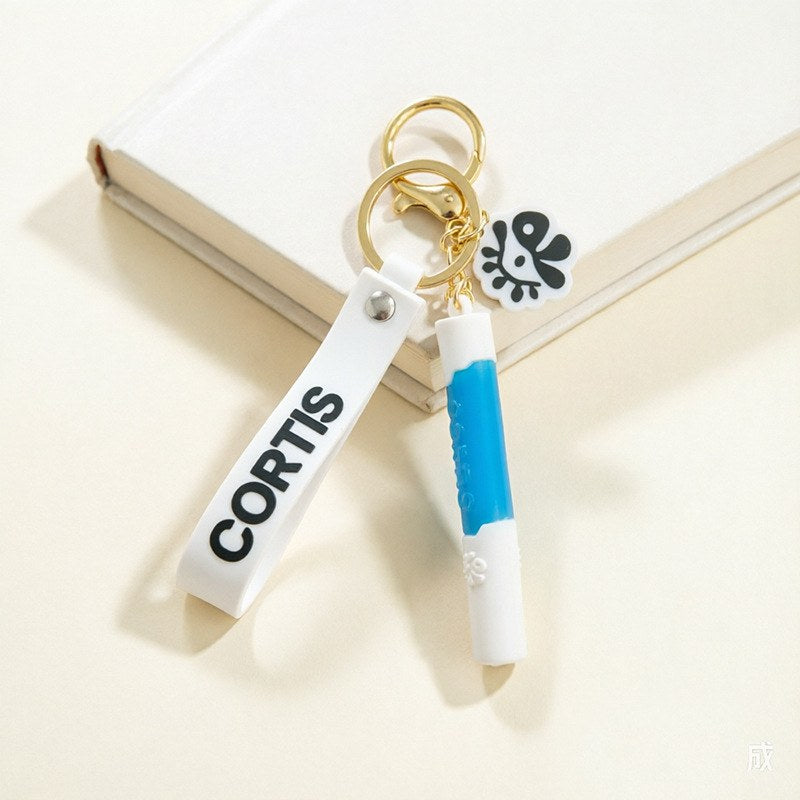 CORTIS rubber keyring packaging