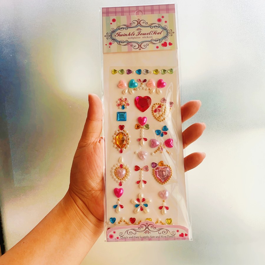 Packaged crystal face stickers