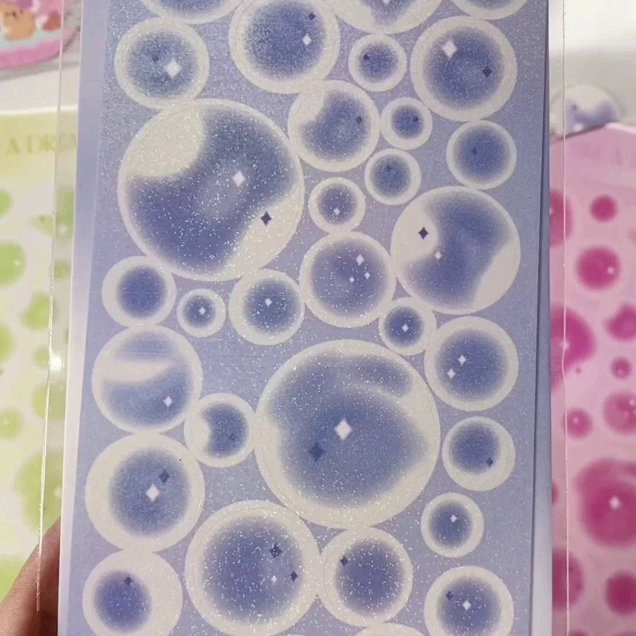 Close-up of purple bubble shimmer stickers