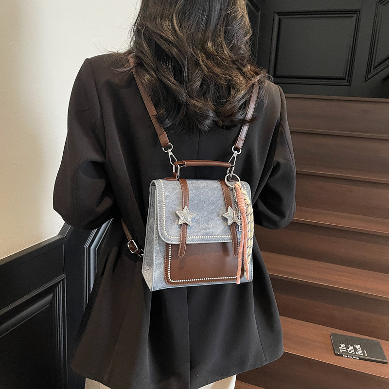 Denim backpack back view styled